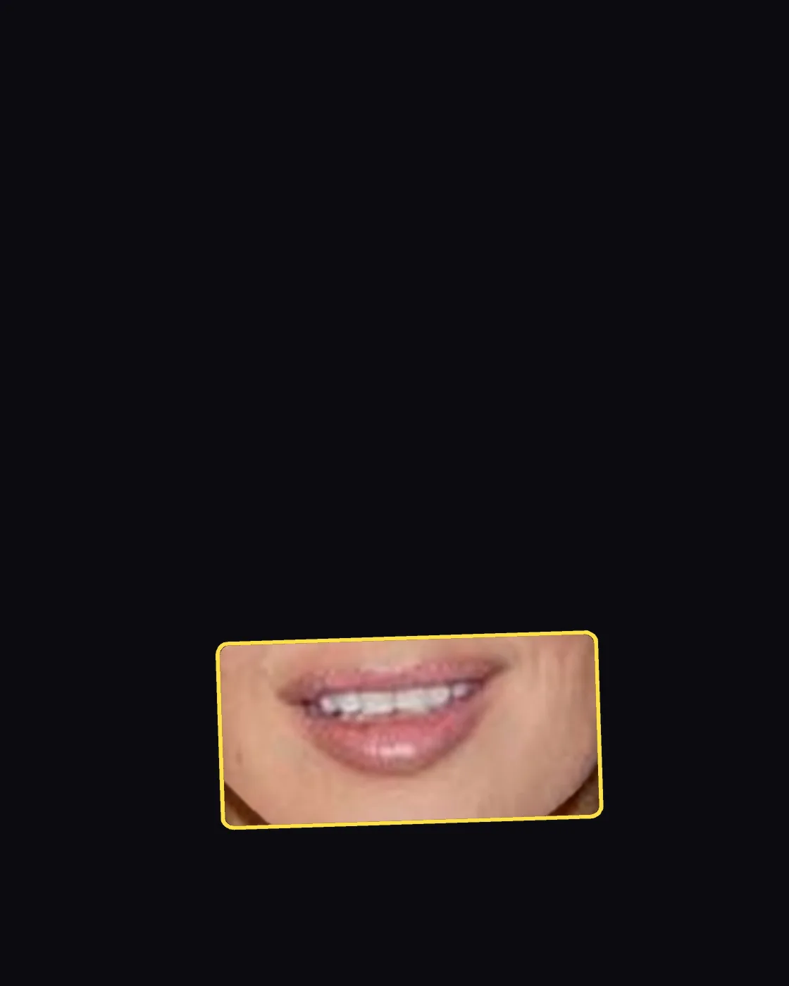 Close crop of a famous person’s lips and smile