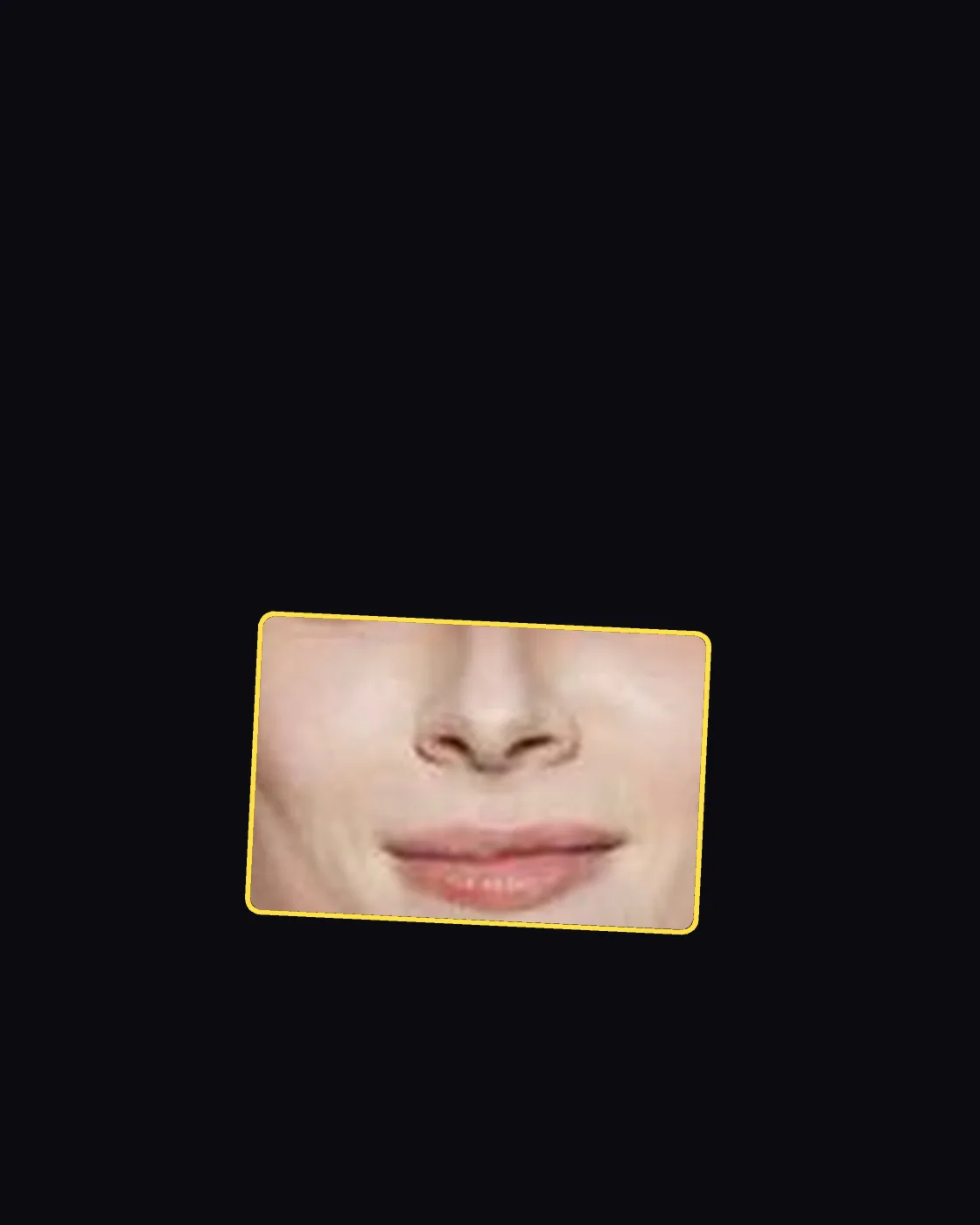 Close crop of a famous person’s nose and jawline