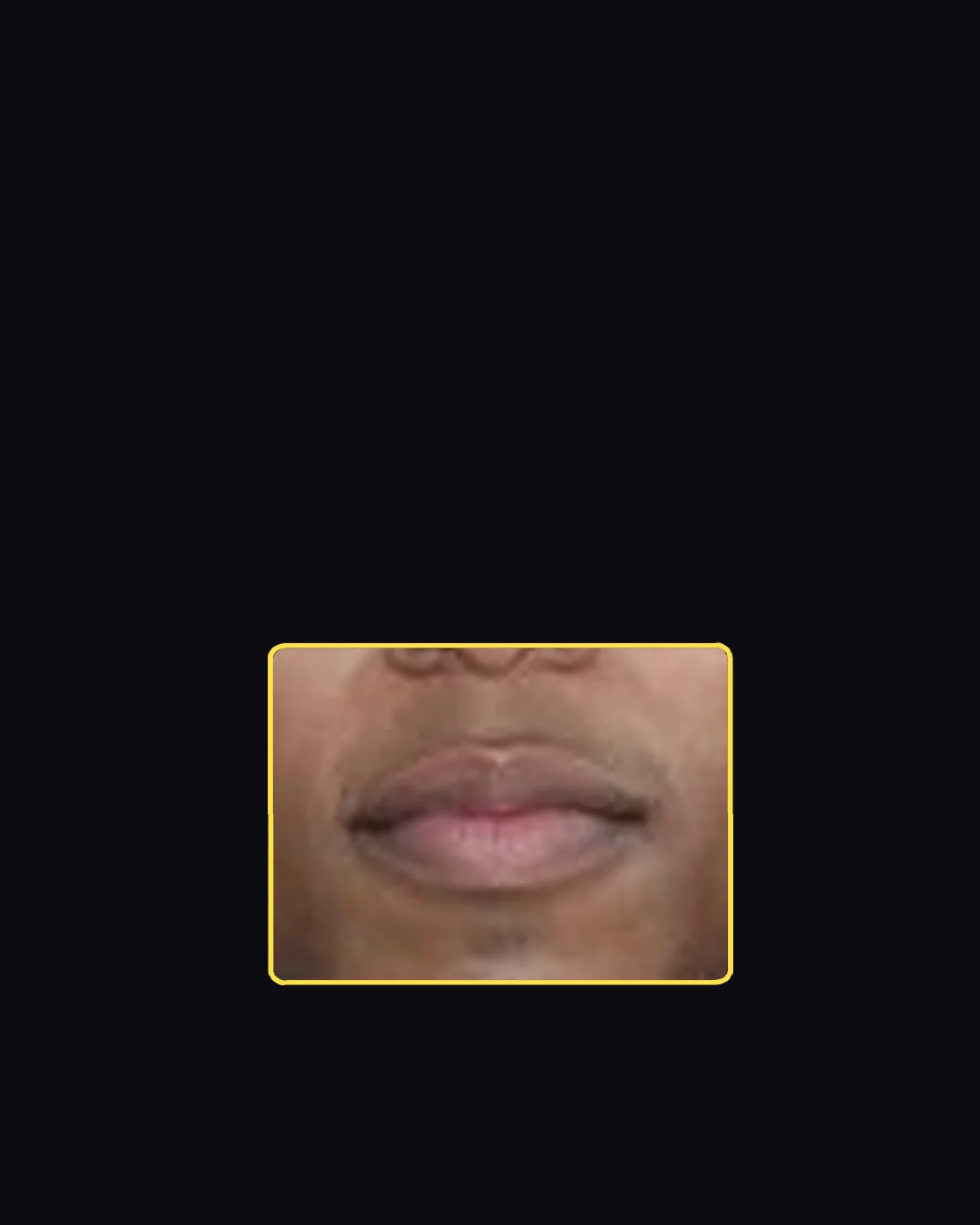 Close crop of a famous person’s lips and smile