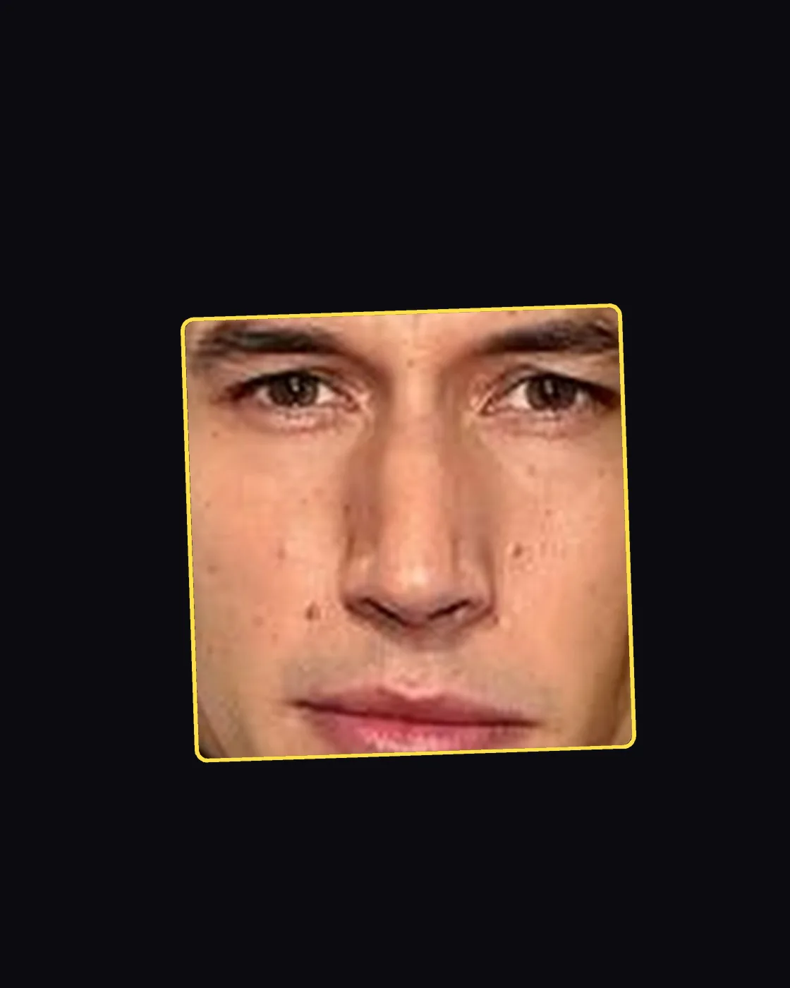 Close crop of a famous person’s nose and jawline