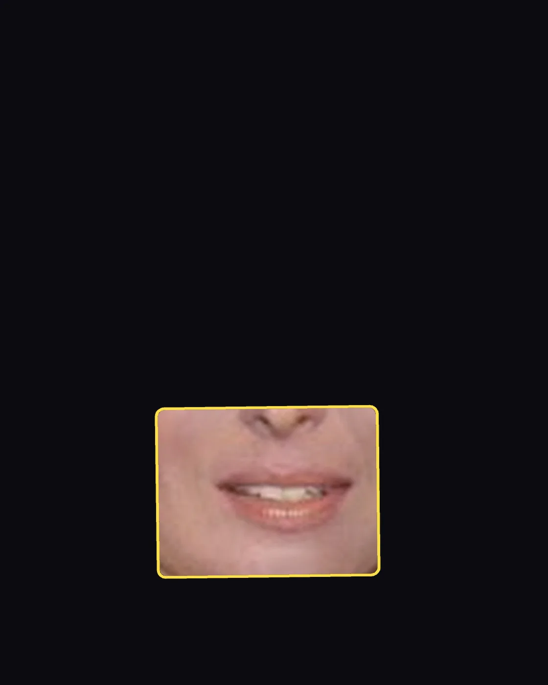 Close crop of a famous person’s nose and jawline