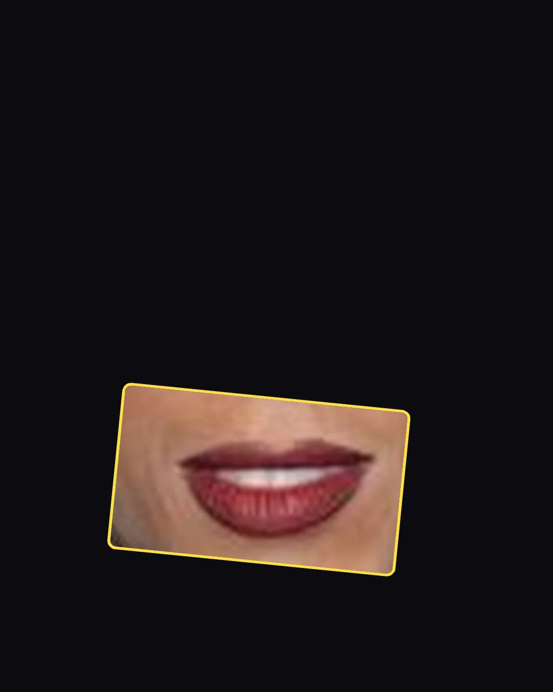 Close crop of a famous person’s lips and smile