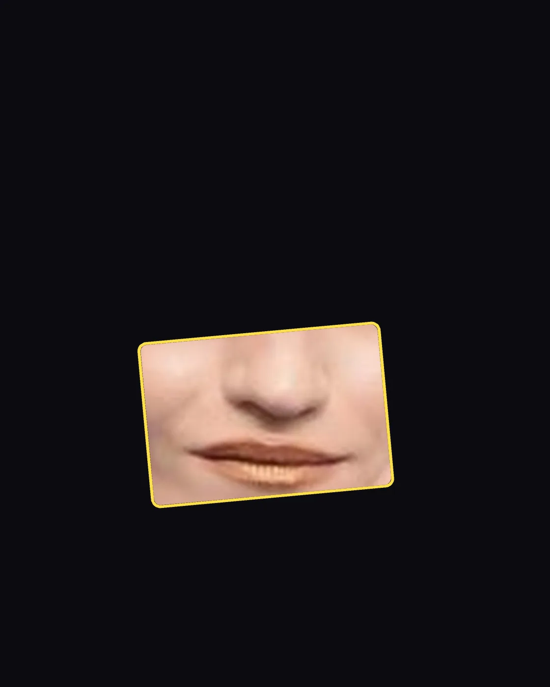 Close crop of a famous person’s nose and jawline