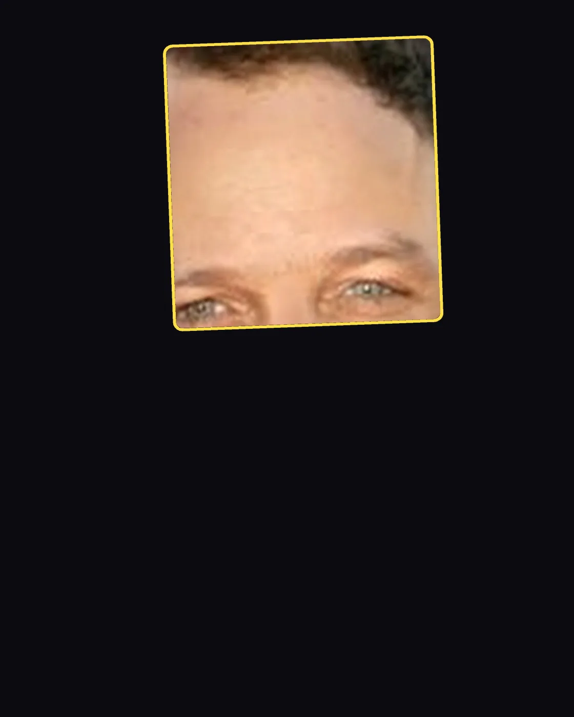 Close crop of a famous person’s hair and forehead