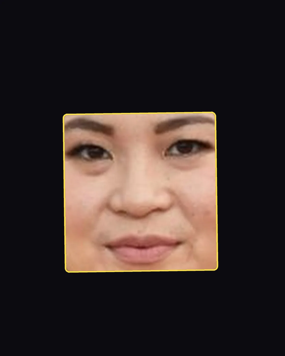 Close crop of a famous person’s nose and jawline