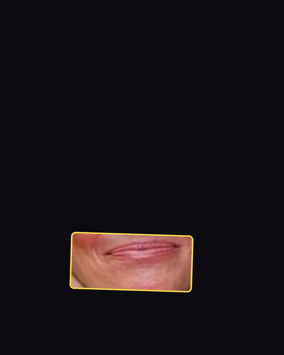 Close crop of a famous person’s lips and smile