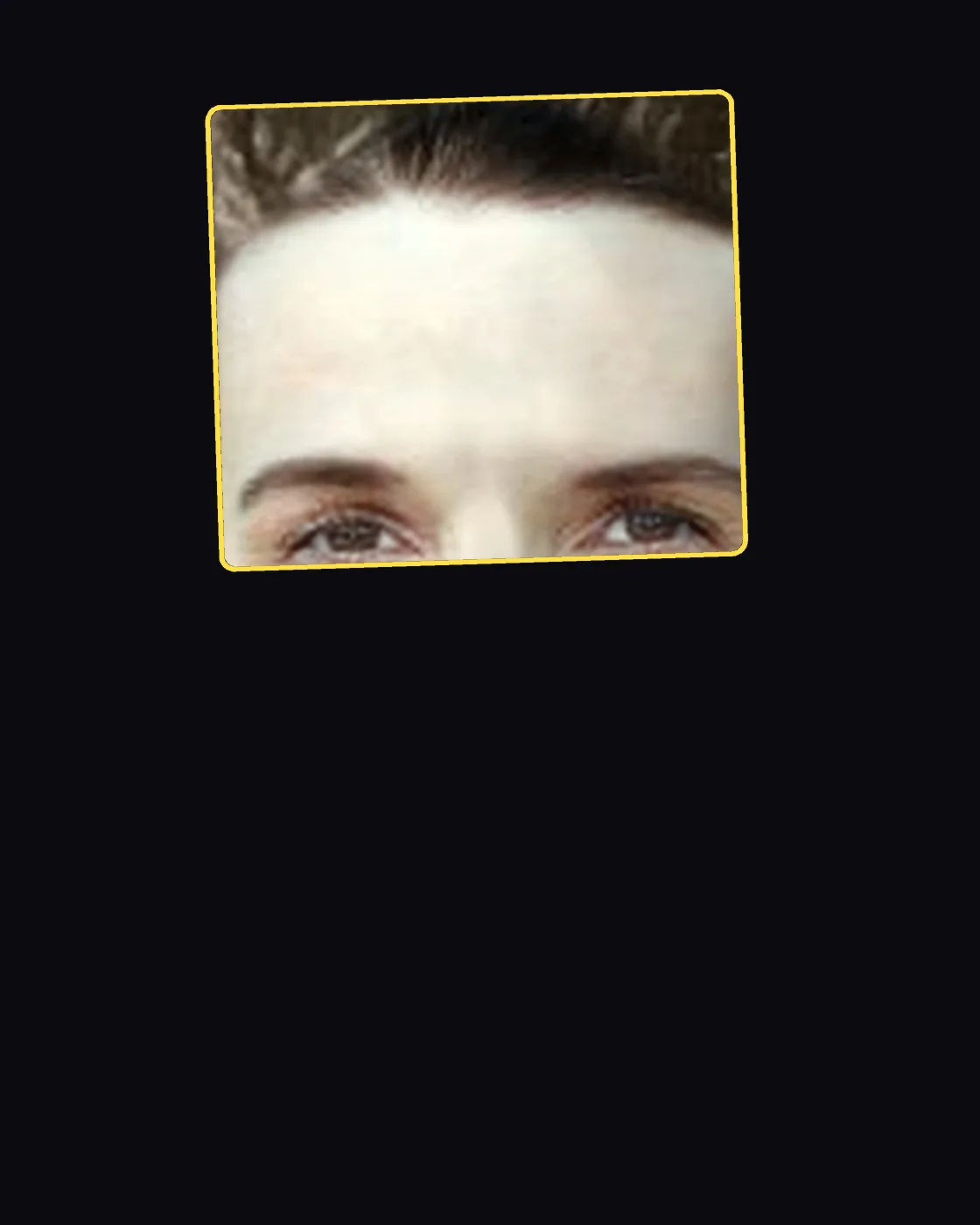 Close crop of a famous person’s hair and forehead